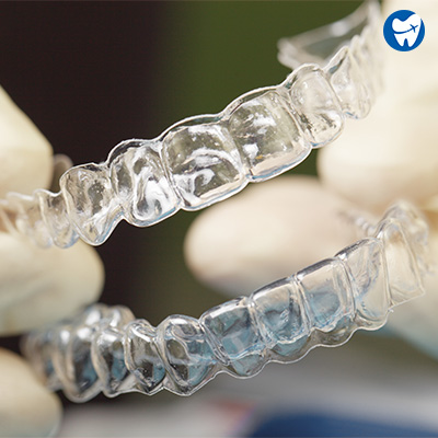 Cleaning clear aligners with a tooth brush