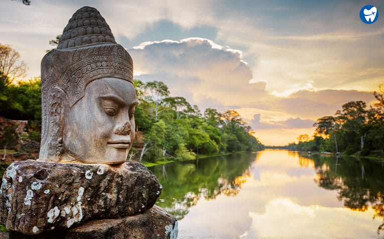  Stone face Asura and sunset in Cambodia