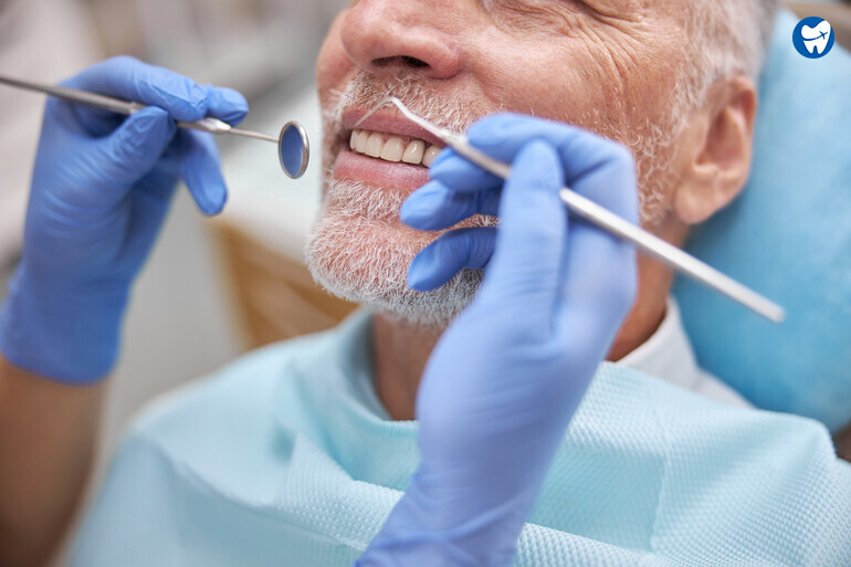 Dentist Examines the Patient