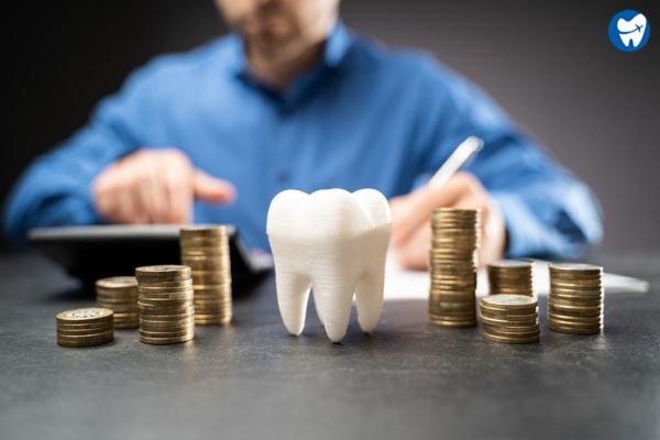 dentists and money with tooth