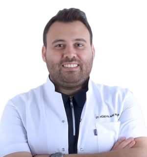 Dr. Hüseyin A. Madenus